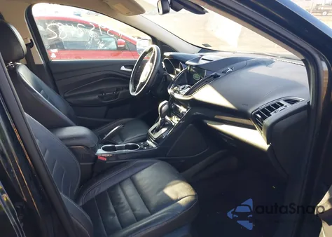 2016 Ford Escape Titanium z USA, uszkodzony, nr VIN 1FMCU9J92GUA36161